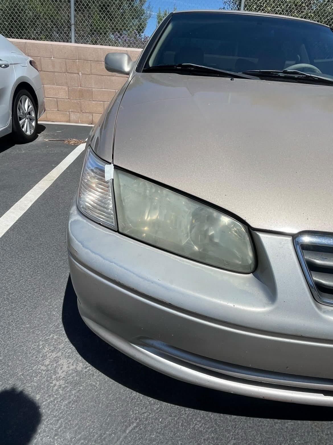 Before: hazy, oxidized headlight lens on a customer car